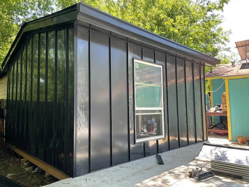 Black standing seam metal wall panels for Metal Roof Installation in Manlius