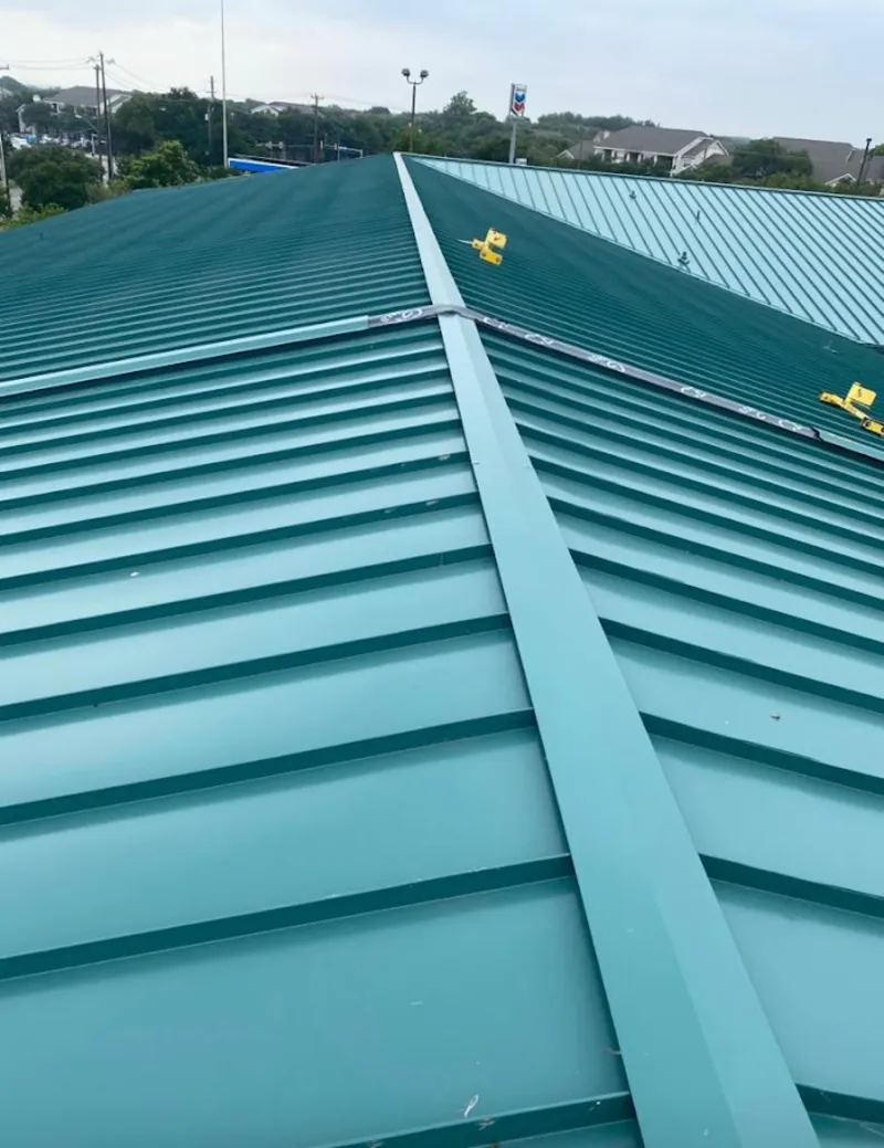 Green commercial metal roof ridge and valley for Metal Roof Repair in Manlius