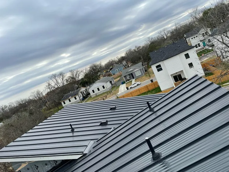 Standing seam metal roof panels with vents for Skylight Repair in Manlius